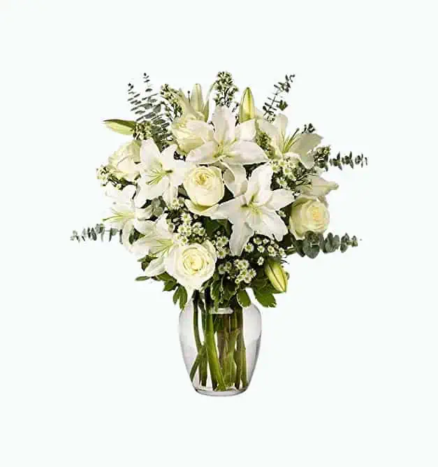 Product Image of the With All Our Sympathy Lily Arrangement (Vase Included)